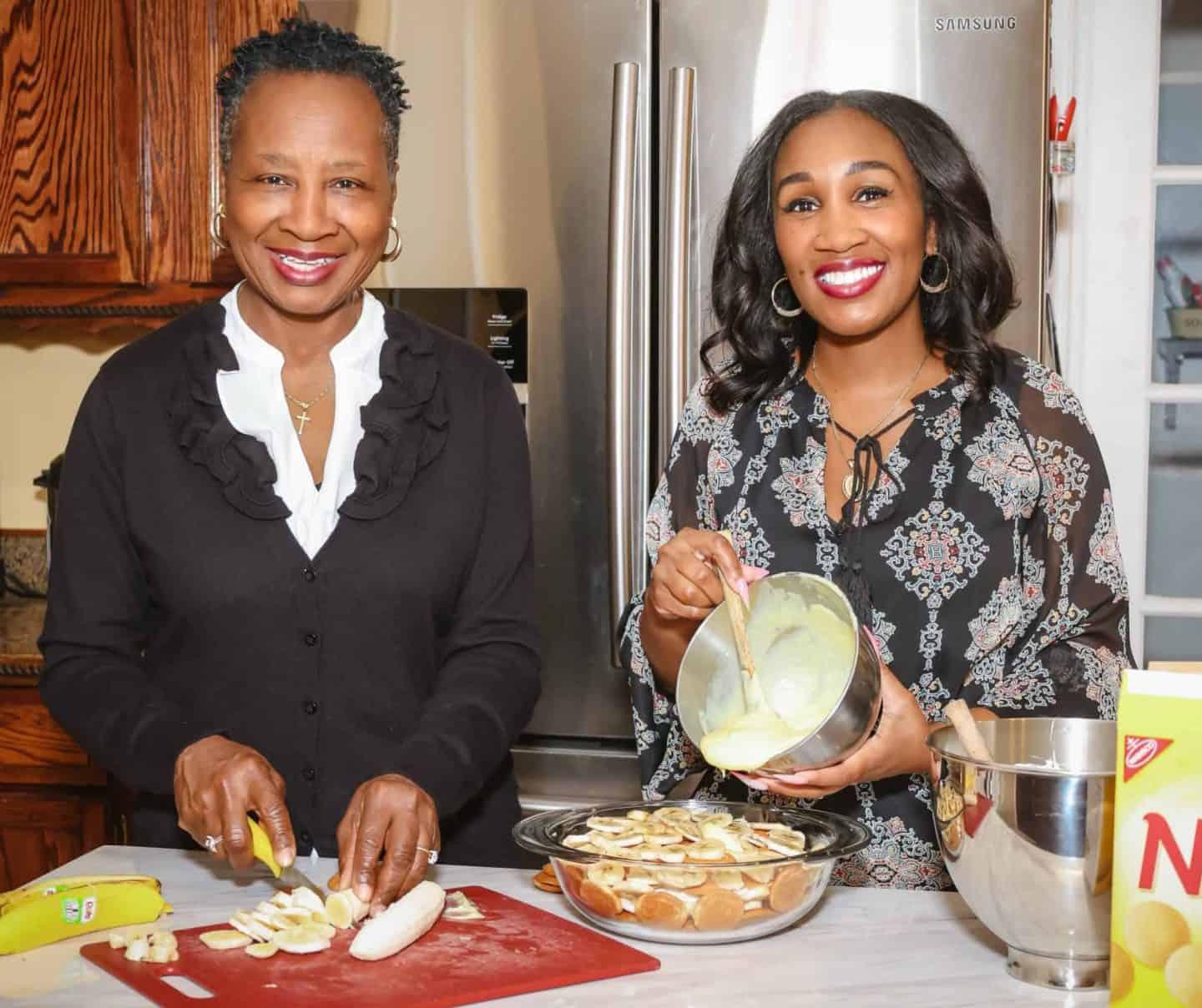 Shaunda Necole and her mom, making homemade banana pudding with vanilla wafers and sliced bananas — classic Black family dessert for Soul Food Sunday dinner by The Soul Food Pot®