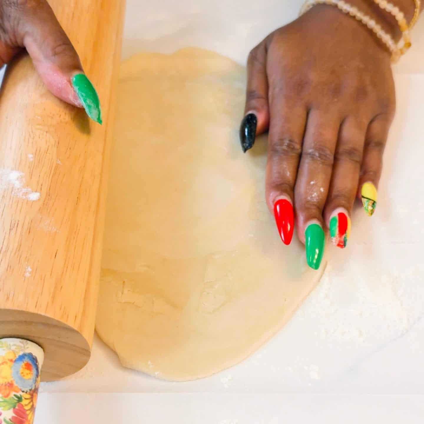 Rolling chilled pie dough to even thickness for sweet potato pie crust — expert technique for preventing shrinkage and ensuring a flaky, golden Southern shortcrust.