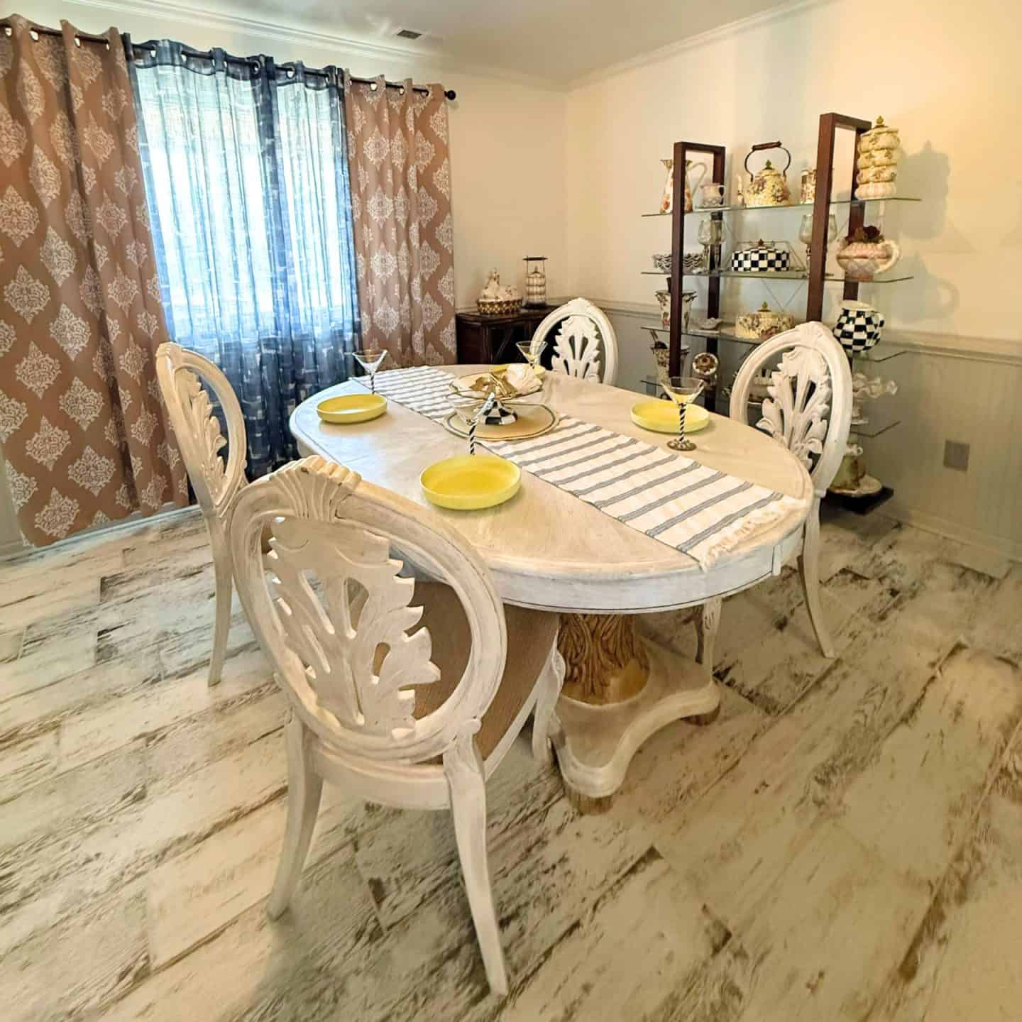 Light and neutral Easter tablescape with wooden dining table, simple place settings, and soft decor, styled by The Soul Food Pot® for Southern holiday hosting inspiration