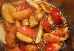 Apples cooking and releasing juices