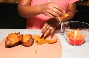 Remove the skins and collect the sweet potato flesh