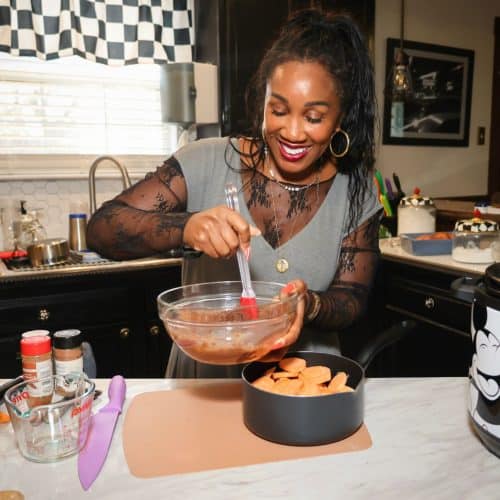 Shaunda Necole mixing the candied yam glaze