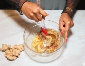 mixing the brown sugar and warm-spice glaze for candied yams