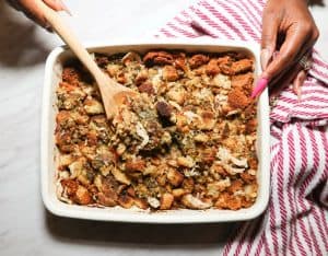 Moist Black folks chicken and dressing with golden cornbread piece