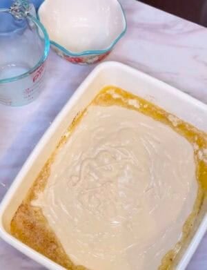 Cobbler batter over melted butter