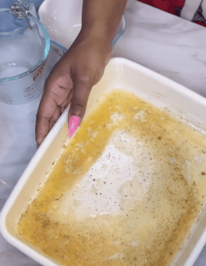 Melted butter in the baking dish