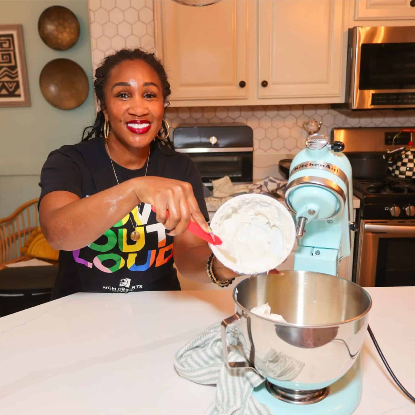 Shaunda Necole mixing the creamy whipped topping for The Soul Food Pot® Black folks’ Southern banana pudding in a stand mixer, showing its thick, fluffy texture.