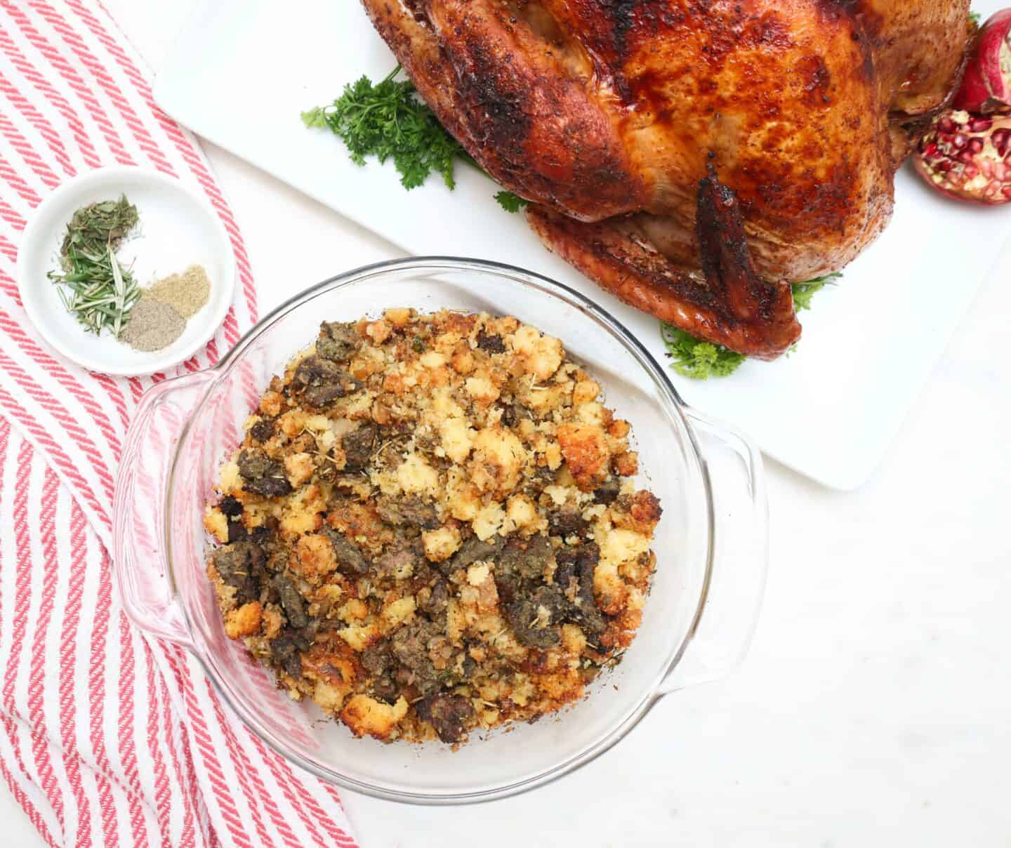 Seasoned roasted turkey with homemade cornbread dressing and herbs, two classics on Shaunda Necole’s soul food Thanksgiving table for The Soul Food Pot®.