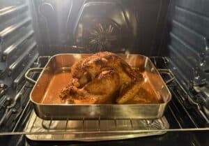 Turkey roasting uncovered in the oven